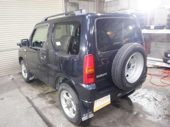 ジムニーワイルドウインド 4WD　本州仕入・ナビ・フルセグTV・キーレス・フォグランプ・シートヒーター・ミラーヒーター・ルーフレール・ターボ・社外AW・ライトレベライザー・電動格納ミラー・DVD再生・JAOSマッドガード 660