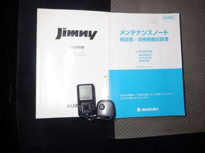 ジムニーワイルドウインド 4WD　本州仕入・ナビ・フルセグTV・キーレス・フォグランプ・シートヒーター・ミラーヒーター・ルーフレール・ターボ・社外AW・ライトレベライザー・電動格納ミラー・DVD再生・JAOSマッドガード 660