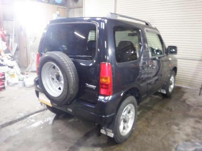 ジムニーワイルドウインド 4WD　本州仕入・ナビ・フルセグTV・キーレス・フォグランプ・シートヒーター・ミラーヒーター・ルーフレール・ターボ・社外AW・ライトレベライザー・電動格納ミラー・DVD再生・JAOSマッドガード 660