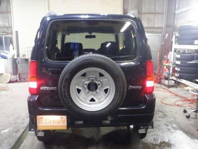 ジムニーワイルドウインド 4WD　本州仕入・ナビ・フルセグTV・キーレス・フォグランプ・シートヒーター・ミラーヒーター・ルーフレール・ターボ・社外AW・ライトレベライザー・電動格納ミラー・DVD再生・JAOSマッドガード 660