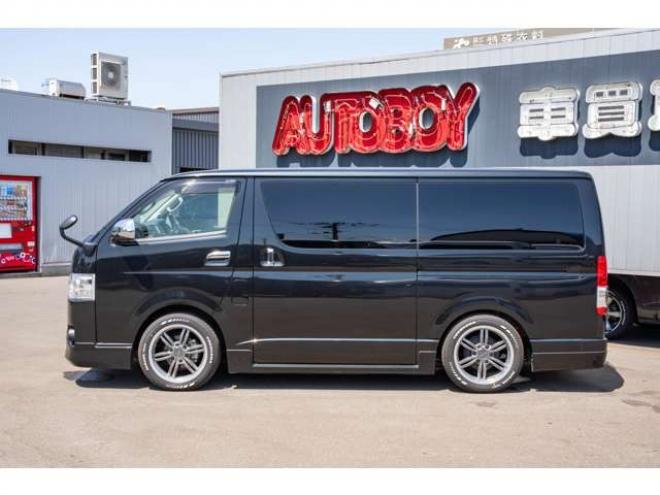 ハイエースバン2.8ダークプライム マルチロールトランスポータータイプIIロング ディーゼルターボ4WD　モデリスタフルエアロ・415COBRAバッドラッカー18インチAW・純正SDナビTV・Bカメラ・両側パワスラ・LEDライト・スマキー・AC100V・ベッドキット・エンスタ 2800