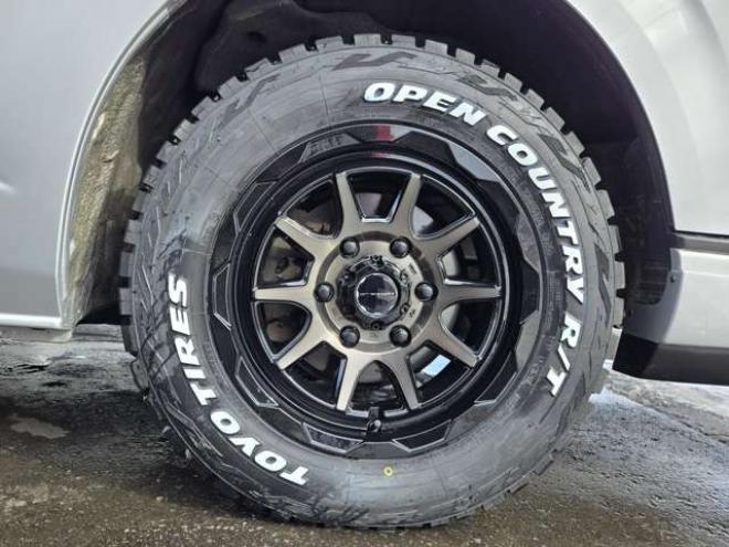 ハイエースバン2.8 DX ワイド スーパーロング ハイルーフ GLパッケージ ディーゼルターボ 4WD　COBRA丸目ヘッドライトKIT　SAFARIフロントスポイラー　リアヒーター&クーラー　キーレス　純正ナビ　ワンセグTV　Bカメラ　オートマチックハイビーム　横滑り防止　車線逸脱　衝突被害軽減　ETC　電動格納ミラー 2800