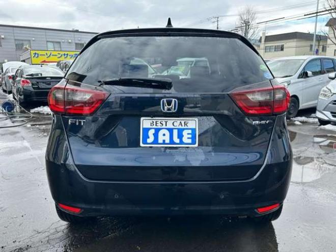 フィット1.5 e:HEV ホーム 4WD　純正ナビ　Bluetooth　バックカメラ　クルーズコントロール　コーナーセンサー　ハーフレザーシート　ETC　ミラーヒーター　横滑り防止装置　ブレーキホールド　USB前後　社外アルミホイール夏 1500