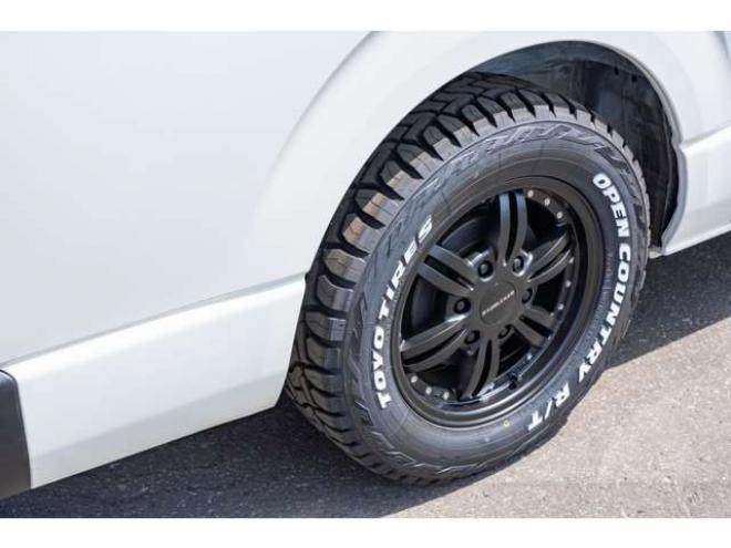 ハイエースバン2.8 DX ロング ディーゼルターボ 4WD　フロントシートセパレート仕様変更済　　　センターコンソール付　415COBRA丸目ライトキット&バッドラッカー16インチAW　415SAFARIフロントスポイラー　TOYOオープンカントリーR/T　電動格納ドアミラー 2800