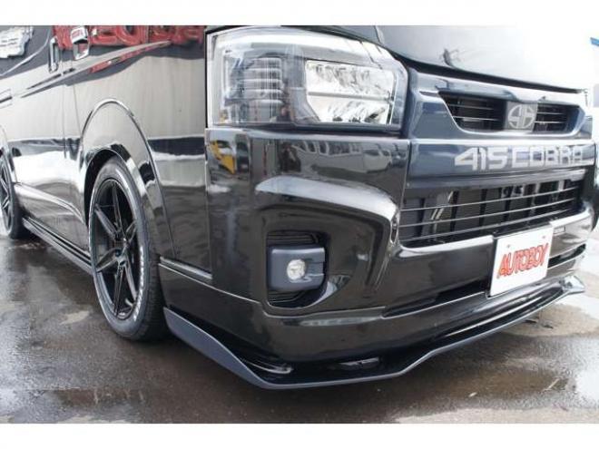 レジアスエース2.8 スーパーGL ダークプライム ロングボディ ディーゼルターボ 4WD　415COBRAオフィシャルコンプリート　ファントムヘッドライトシステム&新作HP-6　18インチホイール&フェイスリフトキット&フルエアロ&フローティングリップ&ローフォルムフェンダー　玄武2インチダウンブロック 2800