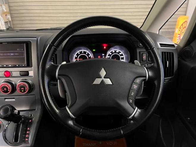 デリカＤ：５　Ｇパワーパッケージ　本州仕入　寒冷地仕様　禁煙車　両側パワースライドドア　エクストリーム１６インチＡＷ＋ＮＥＯＬＩＮホワイトレター　新品ＪＡＯＳブラックマッドガード　アルパイン製リアグリップダウンモニター　ストラーダナビ 4WD 2400 5Dr