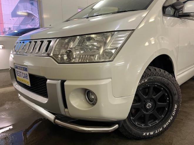 デリカＤ：５　Ｇパワーパッケージ　本州仕入　禁煙車　寒冷地仕様　エクストリーム１６ＡＷ＋ＧＲＩＰＭＡＸホワイトレター　新品ＪＡＯＳブラックマッドガード　純正１８ＡＷ＋スタッドレスタイヤ付　１２インチリアフリップダウンモニター　ＥＴＣ 4WD 2400 5Dr