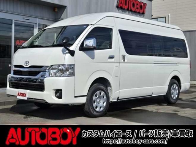 ハイエース2.7 グランドキャビン 4WD　寒冷地　10人乗り　スーパーロング　ワイドボディ　ハイルーフ　プッシュスタート　スマキー　パワスラ　リアヒーター&クーラー　ステアリングスイッチ　車線逸脱防止　衝突被害軽減　横滑り防止　電動格納ミラー 2700
