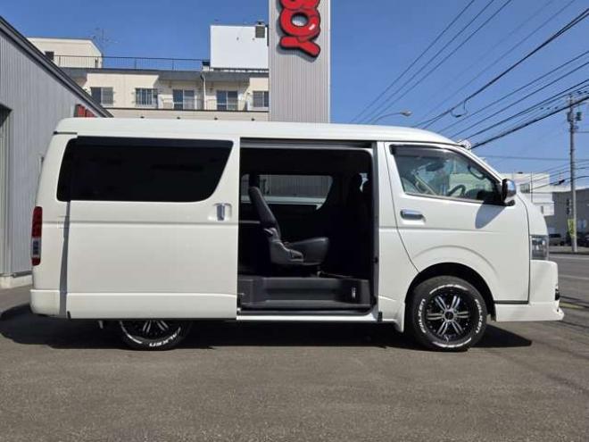 ハイエースバン2.7 スーパーGL ダークプライム ワイド ミドルルーフ ロングボディ 4WD　寒冷地仕様　パワスラ　リアヒーター&クーラー　プッシュスタート　スマートキー　ウッドコンビステアリング&シフトノブ　ハーフレザーシート　ドラレコ　バックカメラ　ETC　メモリナビ　フルセグTV　Bluetooth 2700