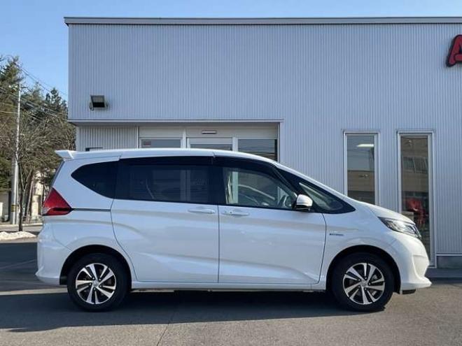 フリード+1.5 ハイブリッド G ホンダセンシング 4WD　社外ナビTV　バックカメラ　両側パワースライドドア　ETC　プッシュスタート　純正エンジンスターター　LEDヘッドライト　ドラレコ　レーダークルーズコントロール　シートヒーター 1500