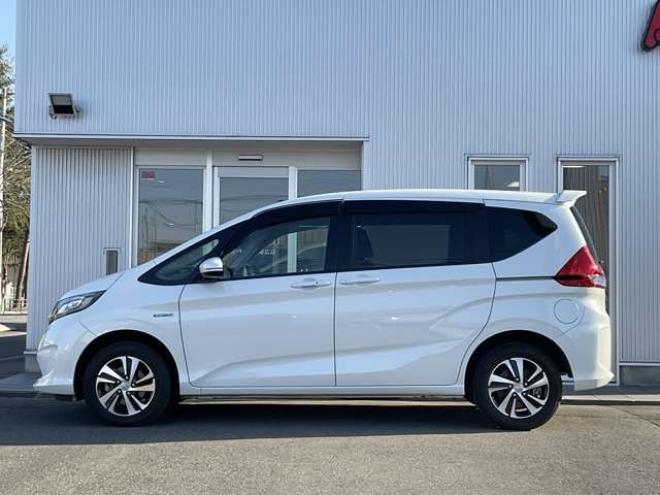 フリード+1.5 ハイブリッド G ホンダセンシング 4WD　社外ナビTV　バックカメラ　両側パワースライドドア　ETC　プッシュスタート　純正エンジンスターター　LEDヘッドライト　ドラレコ　レーダークルーズコントロール　シートヒーター 1500