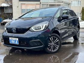 フィット　1.5 e:HEV ホーム 4WD　純正ナビ　Bluetooth　バックカメラ　クルーズコントロール　コーナーセンサー　ハーフレザーシート　ETC　ミラーヒーター　横滑り防止装置　ブレーキホールド　USB前後　社外アルミホイール夏 1500