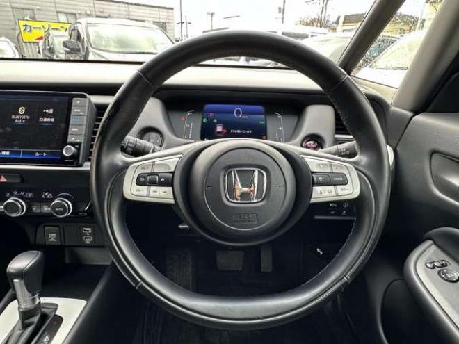 フィット1.5 e:HEV ホーム 4WD　純正ナビ　Bluetooth　バックカメラ　クルーズコントロール　コーナーセンサー　ハーフレザーシート　ETC　ミラーヒーター　横滑り防止装置　ブレーキホールド　USB前後　社外アルミホイール夏 1500