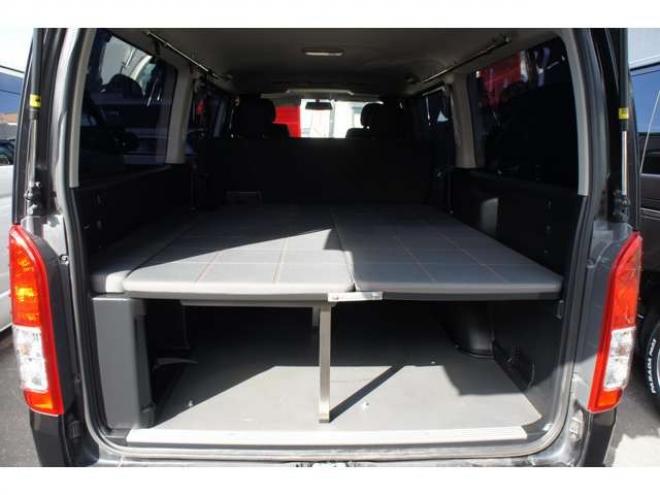 ハイエースバン2.8ダークプライム マルチロールトランスポータータイプIIロング ディーゼルターボ4WD　モデリスタフルエアロ・415COBRAバッドラッカー18インチAW・純正SDナビTV・Bカメラ・両側パワスラ・LEDライト・スマキー・AC100V・ベッドキット・エンスタ 2800