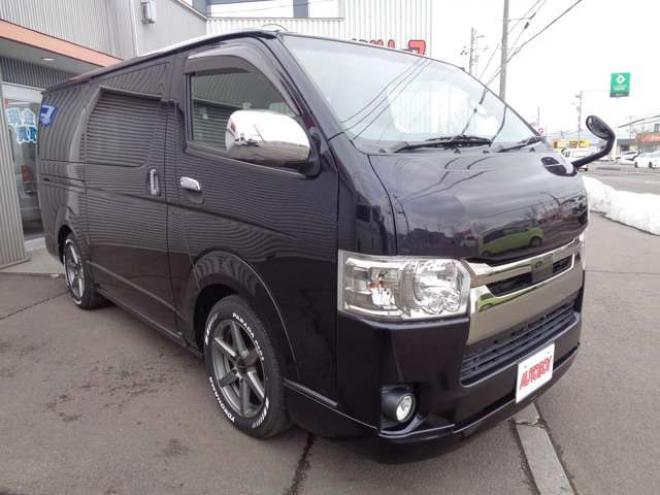 レジアスエース2.8 スーパーGL ダークプライムII ロングボディ ディーゼルターボ 4WD　415COBRA　S-6ボンネット&クリーンルック3Fリップ&ステージ2ルーフスポイラー&バッドラッカーSD-6　17インチAW　ヨコハマPARADA215/60R17　両側パワースライドドア　ETC　社外コンソールBOX　ベットキット 2800