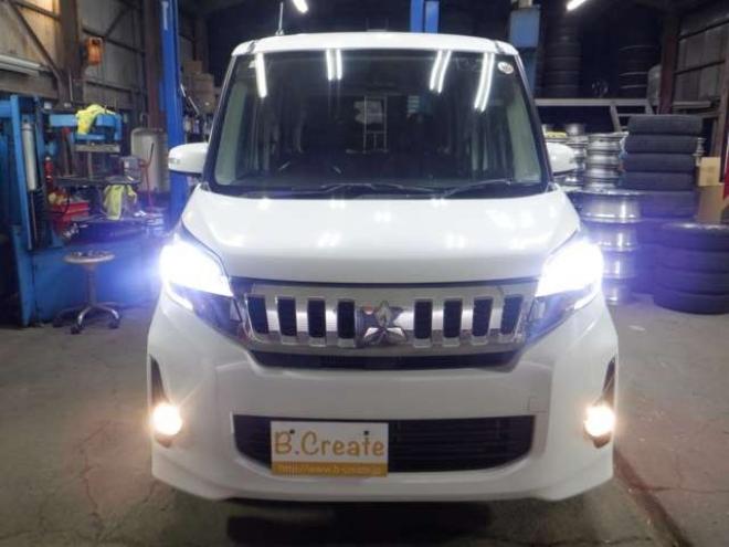 eKスペースカスタム T 4WD　ナビ・TV・Bカメラ・B/T・両側電動・ターボ・スマートキー・プッシュスタート・純正エンスタ・HID・ベンチシート・フォグランプ・リア席サンシェード・シートヒーター・寒冷地仕様 660