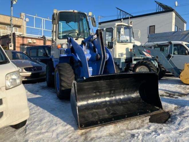 ホイールローダ日立建機株式会社　4WD 1500
