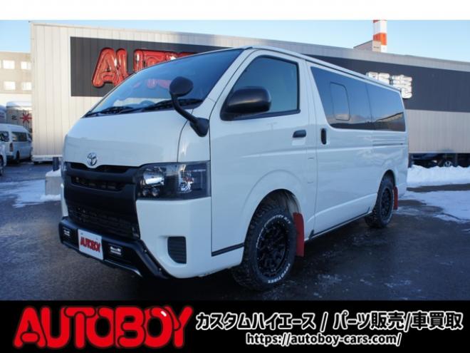 ハイエースバン2.8 DX ロング GLパッケージ ディーゼルターボ 4WD　Bカメラ　TRDフロントスポイラー　マッドフラップ　エセックス16インチアルミ　オープンカントリーRT　LEDヘッドライト　Wエアバッグ　AC100V　8人乗り構造変更済　寒冷地仕様　リアヒーター&エアコン 2800