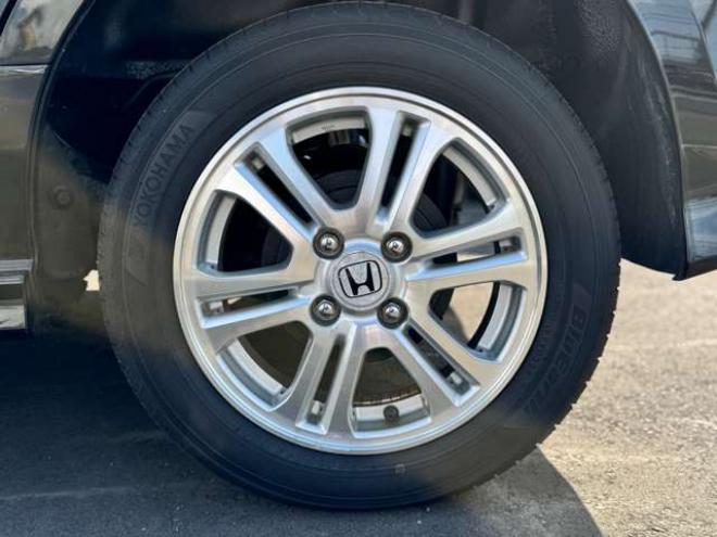 N-BOXカスタムG ターボSSパッケージ 4WD　プッシュスタート・横滑り防止・パドルシフト・クルーズコントロール・両側パワースライドドア・HIDオートライト・フォグランプ・オートエアコン・ETC・ミラーヒーター・純正フルセグTV・純正14incアルミホイール 660