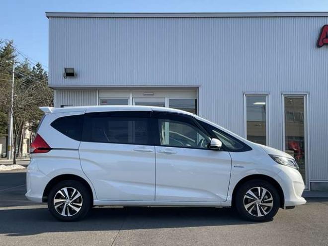 フリード+1.5 ハイブリッド G ホンダセンシング 4WD　社外ナビTV　バックカメラ　両側パワースライドドア　ETC　プッシュスタート　純正エンジンスターター　LEDヘッドライト　ドラレコ　レーダークルーズコントロール　シートヒーター 1500