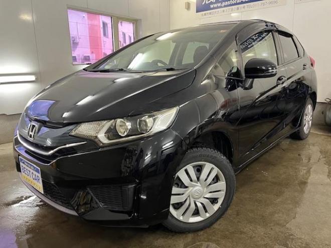 フィット１３Ｇ　Ｌパッケージ　本州仕入　ワンオーナー　寒冷地仕様　禁煙車　社外１５インチＡＷ　スタッドレスタイヤ付　純正ナビ　地デジ　バックカメラ　純正エンジンスターター　フロントガラス熱線　ミラーヒーター　アイドリングストップ 4WD 1300 5Dr