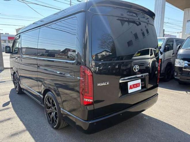 ハイエース2.7 GL ロング ミドルルーフ 4WD　IFUU製　IF-WB8　10人乗り対面ラウンジベッド仕様　415COBRAクリーンルック3フロントスポイラー&バッドラッカー毒牙18インチAW　イクリプス製10.1インチフローティングナヒ　純正EGスターター 2700