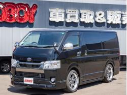 ハイエースバン&nbsp;&nbsp;2.8ダークプライム マルチロ... 2.8ダークプライム マルチロールトランスポータータイプIIロング ディーゼルターボ4WD　モデリスタフルエアロ・415COBRAバッドラッカー18インチAW・純正SDナビTV・Bカメラ・両側パワスラ・LEDライト・スマキー・AC100V・ベッドキット・エンスタ 2800