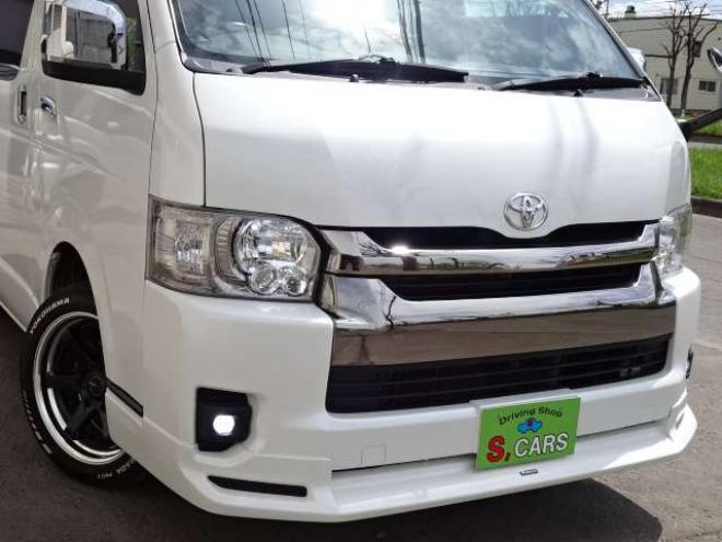 ハイエースバン2.7 スーパーGL ダークプライム ワイド ミドルルーフ ロングボディ 4WD　本州車　保証1年/走行距離無制限 4WD　後期仕様　モデリスタエアロ　両側パワースライドドア　舞杏KBレーシング2アルミホイール　ALPINE製ナビ　地デジ　バックカメラ　現行型ドアミラー　スマートキー ベットキット 2700