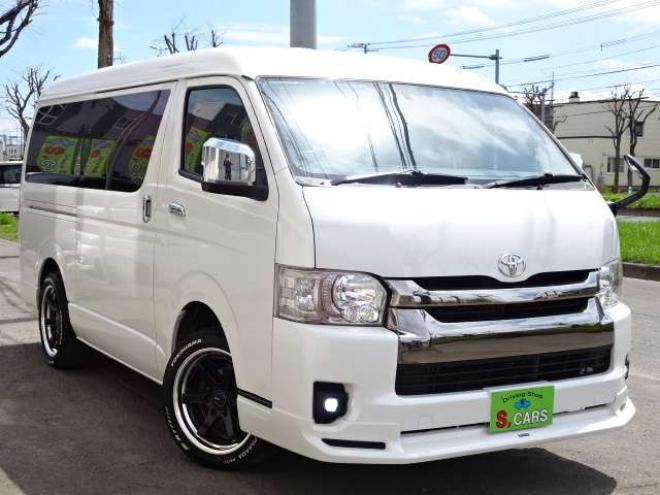ハイエースバン2.7 スーパーGL ダークプライム ワイド ミドルルーフ ロングボディ 4WD　本州車　保証1年/走行距離無制限 4WD　後期仕様　モデリスタエアロ　両側パワースライドドア　舞杏KBレーシング2アルミホイール　ALPINE製ナビ　地デジ　バックカメラ　現行型ドアミラー　スマートキー ベットキット 2700