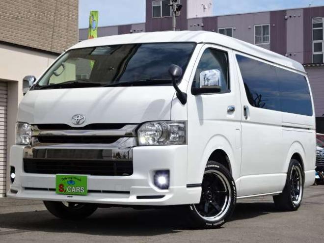 ハイエースバン2.7 スーパーGL ダークプライム ワイド ミドルルーフ ロングボディ 4WD　本州車　保証1年/走行距離無制限 4WD　後期仕様　モデリスタエアロ　両側パワースライドドア　舞杏KBレーシング2アルミホイール　ALPINE製ナビ　地デジ　バックカメラ　現行型ドアミラー　スマートキー ベットキット 2700