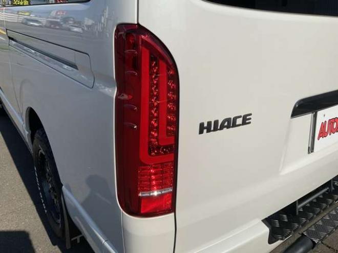 ハイエースバン2.7 スーパーGL ダークプライムII ワイド ミドルルーフ ロングボディ 4WD　TOYOオープンカントリーR/T215/65R16　ナイトロパワーM29スティンガー16インチAW　ワンオーナー　社外ナビTV　両側パワースライドドア　ETC　Pivot製クルコン　Tom's製テールライト　JAOS リヤスキッドバー 2700