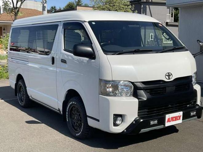 ハイエースバン2.7 スーパーGL ダークプライムII ワイド ミドルルーフ ロングボディ 4WD　TOYOオープンカントリーR/T215/65R16　ナイトロパワーM29スティンガー16インチAW　ワンオーナー　社外ナビTV　両側パワースライドドア　ETC　Pivot製クルコン　Tom's製テールライト　JAOS リヤスキッドバー 2700