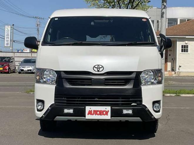 ハイエースバン2.7 スーパーGL ダークプライムII ワイド ミドルルーフ ロングボディ 4WD　TOYOオープンカントリーR/T215/65R16　ナイトロパワーM29スティンガー16インチAW　ワンオーナー　社外ナビTV　両側パワースライドドア　ETC　Pivot製クルコン　Tom's製テールライト　JAOS リヤスキッドバー 2700