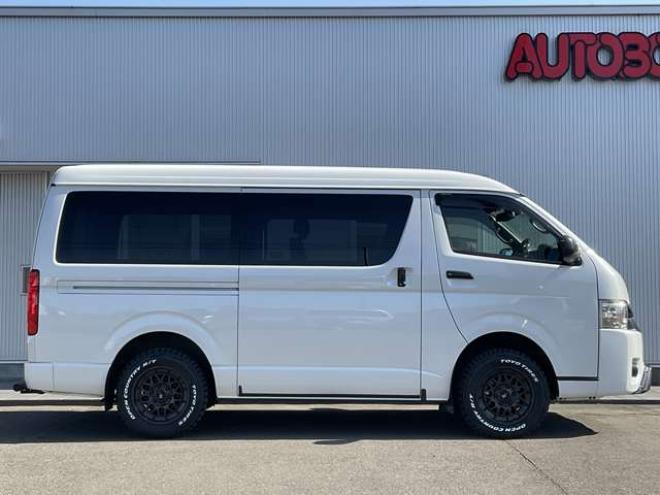 ハイエースバン2.7 スーパーGL ダークプライムII ワイド ミドルルーフ ロングボディ 4WD　TOYOオープンカントリーR/T215/65R16　ナイトロパワーM29スティンガー16インチAW　ワンオーナー　社外ナビTV　両側パワースライドドア　ETC　Pivot製クルコン　Tom's製テールライト　JAOS リヤスキッドバー 2700