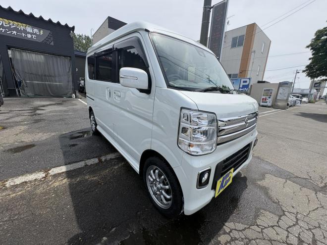 エブリイEVERY WAGON 4WD PZ-SP寒冷地仕様　ハイルーフ　リビルトエンジン　両パワスラ　オートステップ　ブレーキアシスト　VSC　HID ブルートースナビ　バックカメラ　PUSHスタート　スペアーアリ　エンジンスターターETC　夏タイヤ新品スタットレス付全磨き済 4WD 660 5Dr