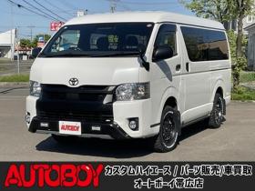 ハイエースバン　2.7 スーパーGL ダークプライムII ワイド ミドルルーフ ロングボディ 4WD　TOYOオープンカントリーR/Tタイヤ　ナイトロパワーM29スティンガー16インチAW　ワンオーナー　両側パワースライドドア　ETC　Pivot製オートクルーズ付きスロコン　Tom's製テールライト　JAOS リヤスキッドバー 2700