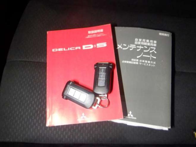 デリカD：5 2.4 G パワーパッケージ 4WD　本州仕入・ナビ・TV・B/T・Bカメラ・両側電動・16インチオープンカントリーR/Tタイヤ・リアモニター・スマートキー・リアヒーター・フォグランプ・クルコン・HID・パドルシフト・ETC・フルフラットシート 2400