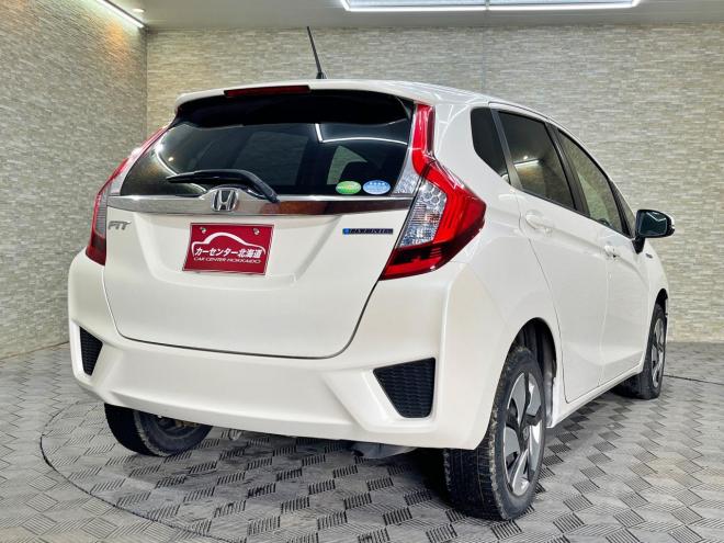 フィット1.5ハイブリッドFパッケージ 4WD 5年保証 スマキー ナビ ETC 自社認証工場 車検整備2年付 修復歴無 寒冷地仕様 禁煙