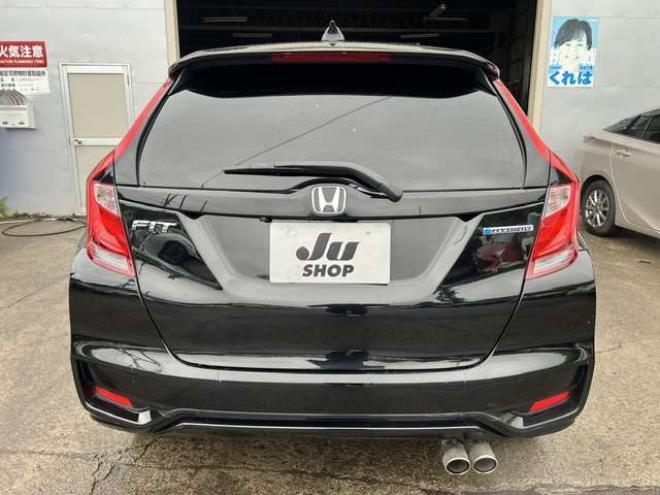フィットハイブリッド　モデューロスタイル　法定12ヵ月点検整備付・本州仕入車両・Bluetooth対応純正ナビ・カラーバックモニター・ドライブレコーダー・モデューロスタイル・モデューロマフラー 2WD 1500