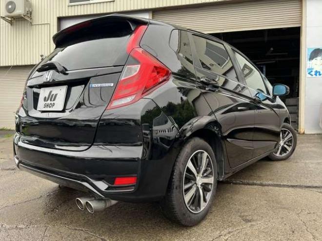 フィットハイブリッド　モデューロスタイル　法定12ヵ月点検整備付・本州仕入車両・Bluetooth対応純正ナビ・カラーバックモニター・ドライブレコーダー・モデューロスタイル・モデューロマフラー 2WD 1500