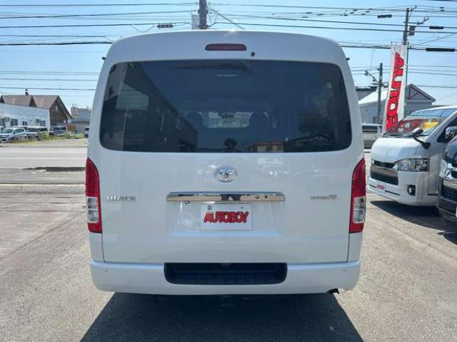 ハイエースバン2.7 スーパーGL ダークプライム ワイド ミドルルーフ ロングボディ 4WD　Pスタート スマートキー 両側スライドドア　OPLEDヘッドライト Fフォグ ハーフレザーシート AC100V ベンチシート　ベッドキット リアクーラー ヒーター ステアリングスイッチ ディスプレイオーディオ　Bluetooth 2700