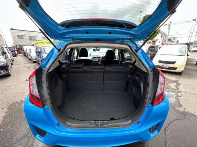 フィット1.5 ハイブリッド Fパッケージ 4WD　Gathersナビ　Bluetoothオーディオ　ワンセグTV　横滑り防止装置　12V180W　インテリジェントキー　バックモニター　スチールホイール冬 1500
