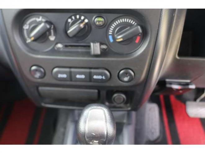 ジムニーワイルドウインド 4WD　検二年　社外ナビ　バックモニター　ETC　自社　ローンカノウ 660