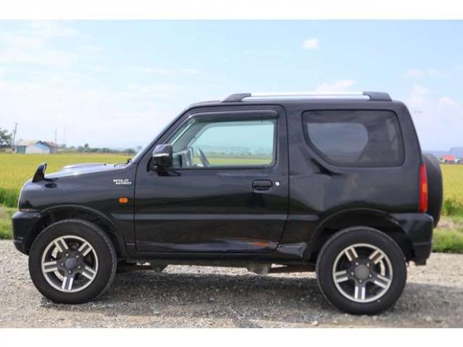 ジムニーワイルドウインド 4WD　検二年　社外ナビ　バックモニター　ETC　自社　ローンカノウ 660