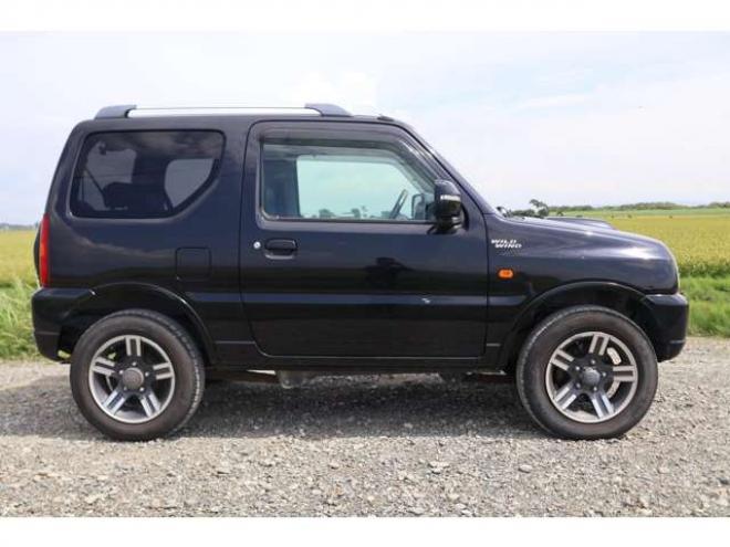 ジムニーワイルドウインド 4WD　検二年　社外ナビ　バックモニター　ETC　自社　ローンカノウ 660