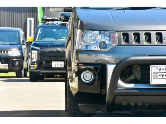 デリカＤ：５ Ｄ パワーパッケージ ４ＷＤ Ｆグリルラプターペイント 新品タイヤ／アルミ 新品フロントガード シートカバー ステップ付 社外ナビ／ＴＶ／バックカメラ マッドフラップ（北海道） 4WD 2200(D) 5Dr
