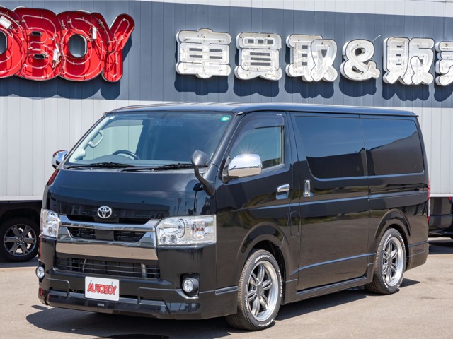 ハイエースバン&nbsp;&nbsp;2.8ダークプライム マルチロ...&nbsp;2.8ダークプライム マルチロールトランスポータータイプIIロング ディーゼルターボ4WD　モデリスタフルエアロ・415COBRAバッドラッカー18インチAW・純正SDナビTV・Bカメラ・両側パワスラ・LEDライト・スマキー・AC100V・ベッドキット・エンスタ 2800
