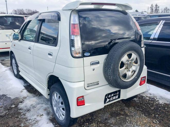 テリオスキッドカスタムＬ ４ＷＤ　禁煙車　寒冷地仕様　１年保証 MT