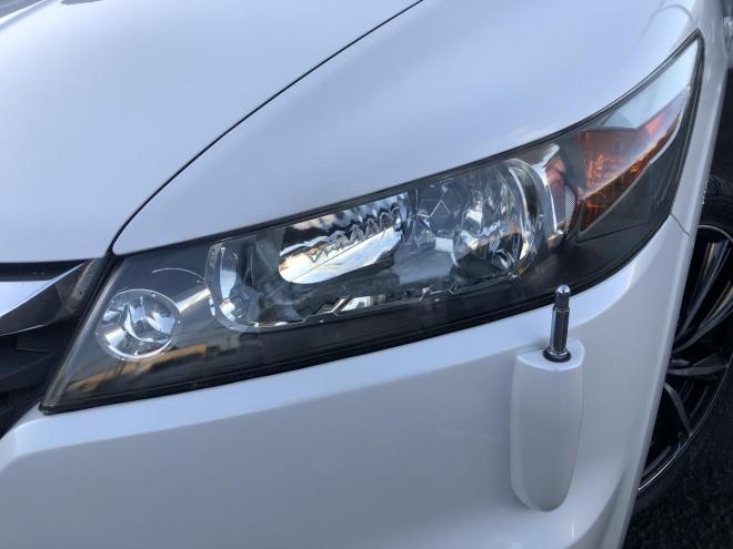 ストリームＸスタイリッシュエディションパッケージ　純正ＣＤナビ　バックカメラ　ＷＥＤＳレオニス１８インチ　ＨＩＤ　ＥＴＣ　レべライザ―　フロントガラス熱線　コーナーポール　タイミングチェーン　4WD 　カタログ燃費１３．８ｋｍ／Ｌ　1800 5Dr